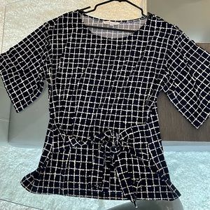 New without tags black and white blouse with tie. Size L